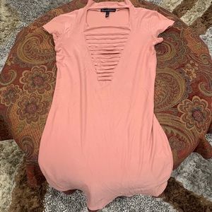 Slim Dress with slits around chest area.